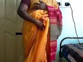 desi  indian insatiable tamil telugu kannada malayalam hindi cuckold wife vanitha wearing orange colour saree  showing big boobs and shaved honeypot press hard boobs press nipple touching honeypot masturbation